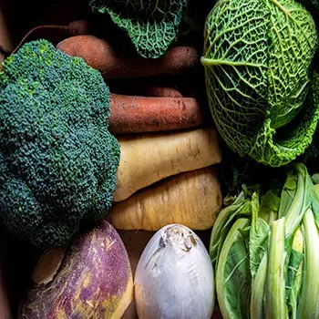 winter-vegetables-carrots-radish-peas-garlic-grow-in-winter-greenhouse