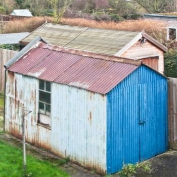 old rusty metal shed