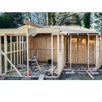 shed being build with foundation in garden